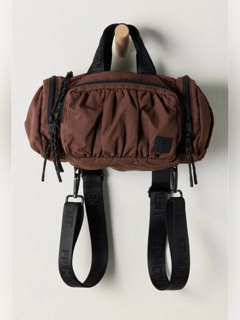 Free people never still convertible sling bag